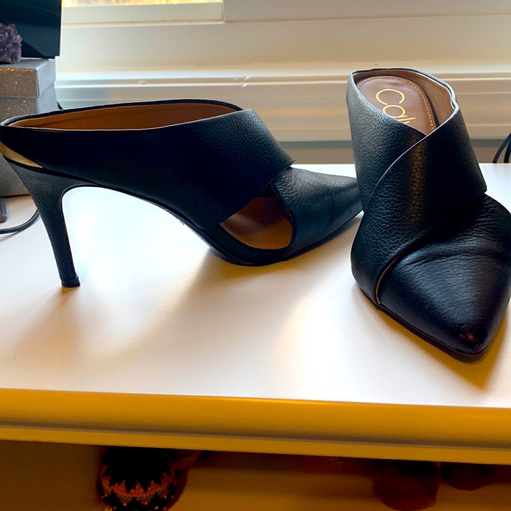 Calvin Klein leather slip ins